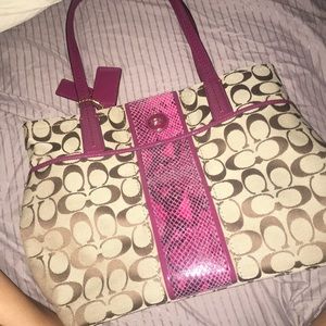Tan coach purse with fuchsia straps